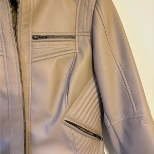 Womens XL very stylish genuine leather tan jacket.